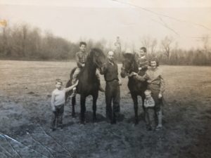 Watching Dad Feed the Horses